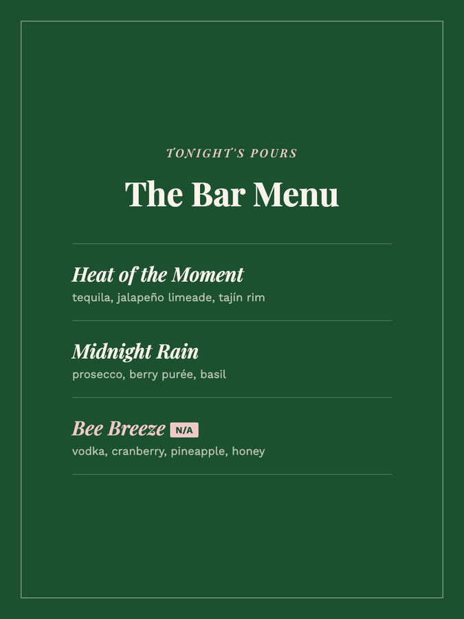 Printed bar menu sign listing signature cocktails